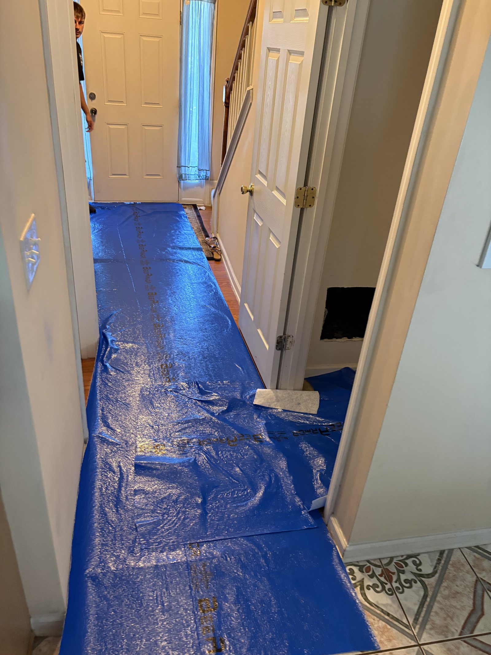 Floor protection laid down a hallway before work starts